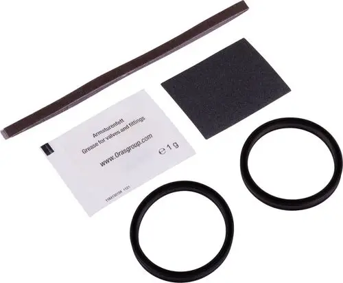 Zubehörset mit Dichtungen, Schaumstoff, Schleifmaterial und Schmiermittel für HANSA-Produkte, geeignet zur Wartung und Abdichtung von Armaturen.