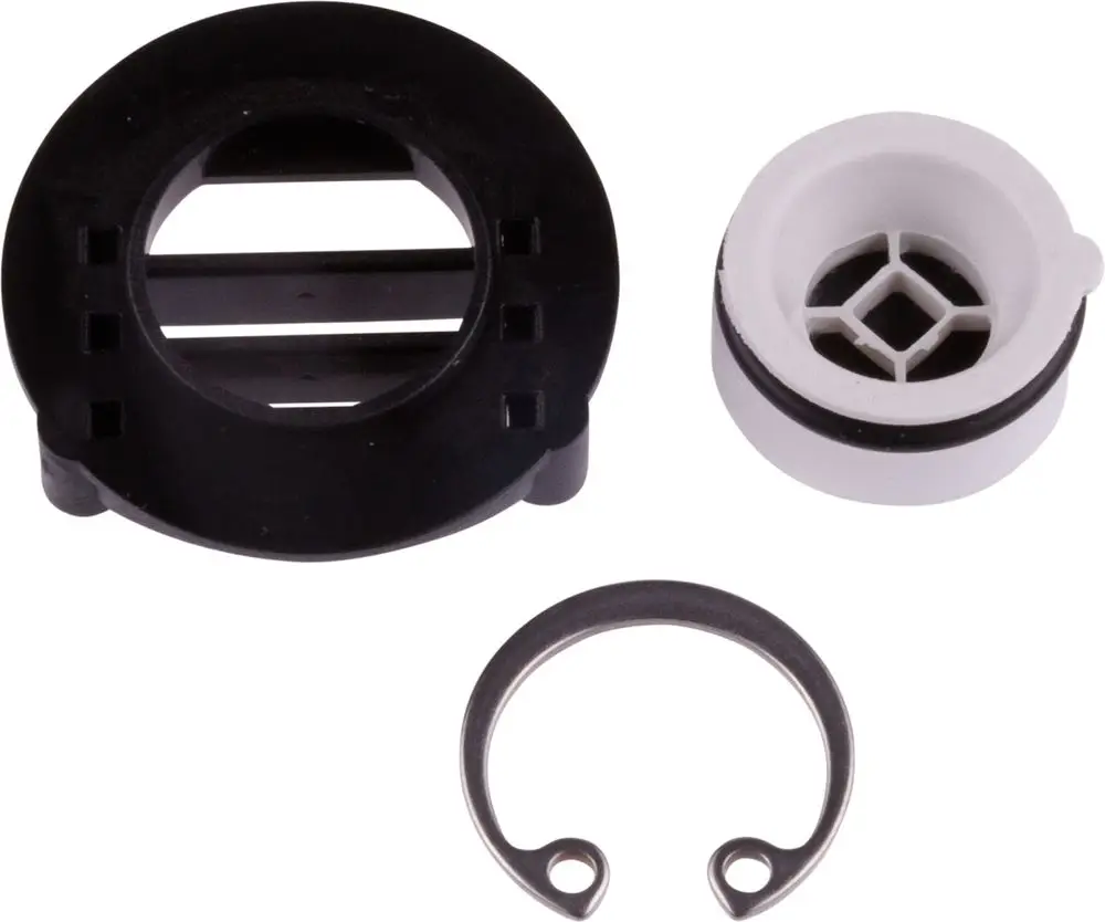 Drei Komponenten eines HANSAbereichs: ein schwarzes Gehäuse mit Öffnungen, ein weißes Innenteil mit Rillen und ein metallischer Sicherungsring.