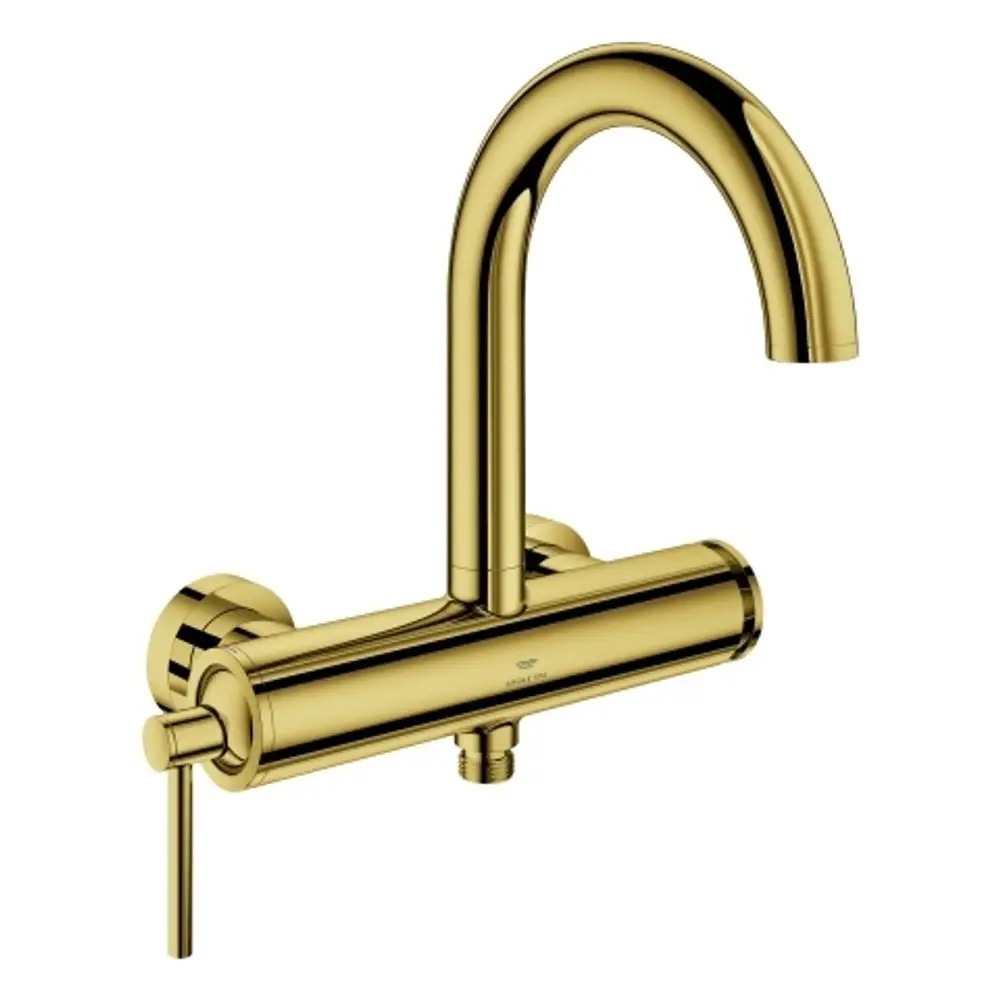 Wandmontierte Grohe Einhand-Wannenbatterie mit einem geschwungenen Auslauf und einem seitlichen Bedienhebel in einem goldenen Finish.