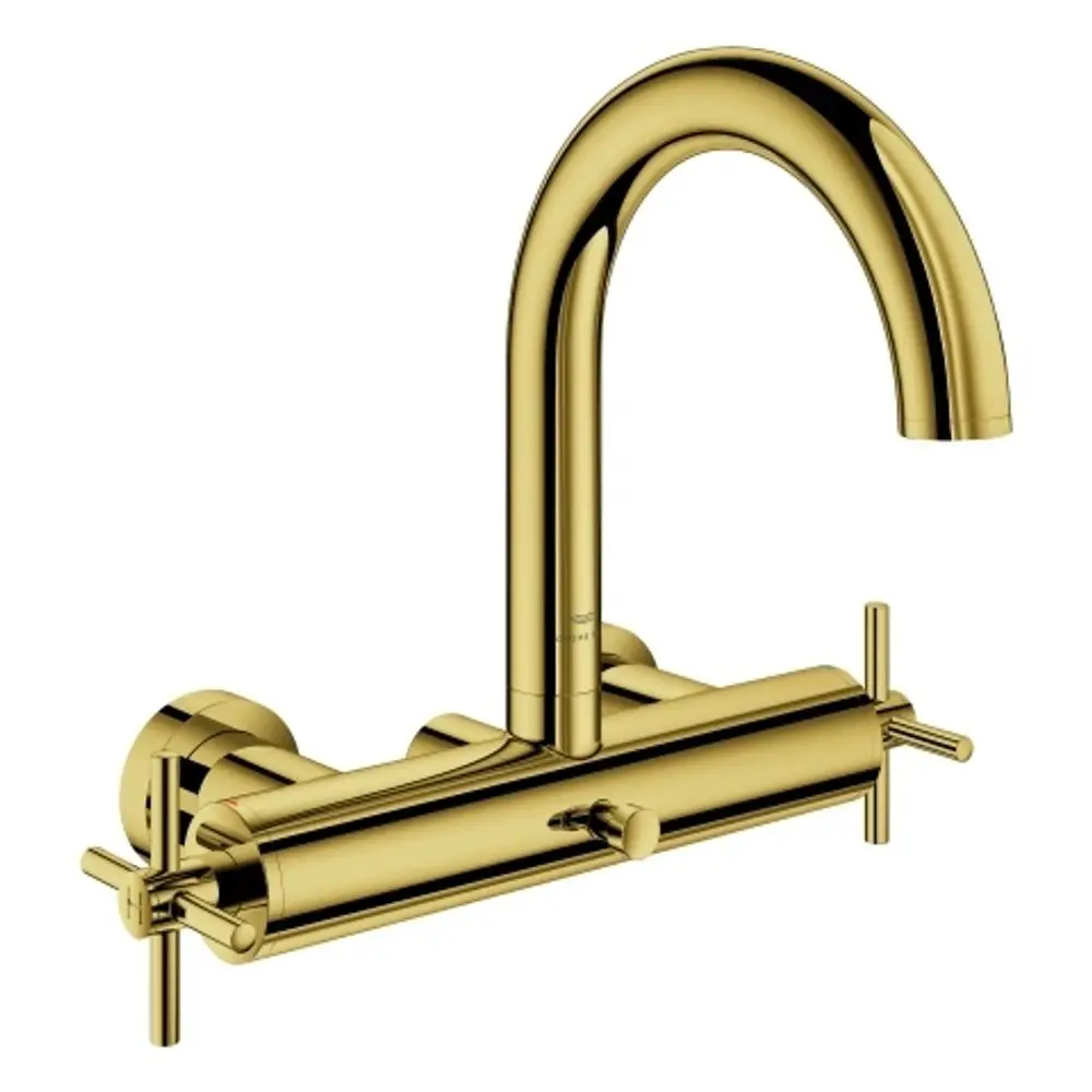 Wannenbatterie von Grohe in Goldoptik, Wandmontage, mit zwei Kreuzgriffen und einem hohen, geschwungenen Auslauf.