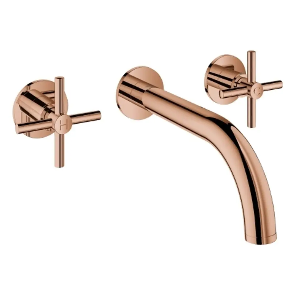 Wandmontierte Grohe-Wasserhahn-Batterie mit zwei Kreuzgriffen und einem gebogenen Auslauf in einer warmen Roségoldfarbe.