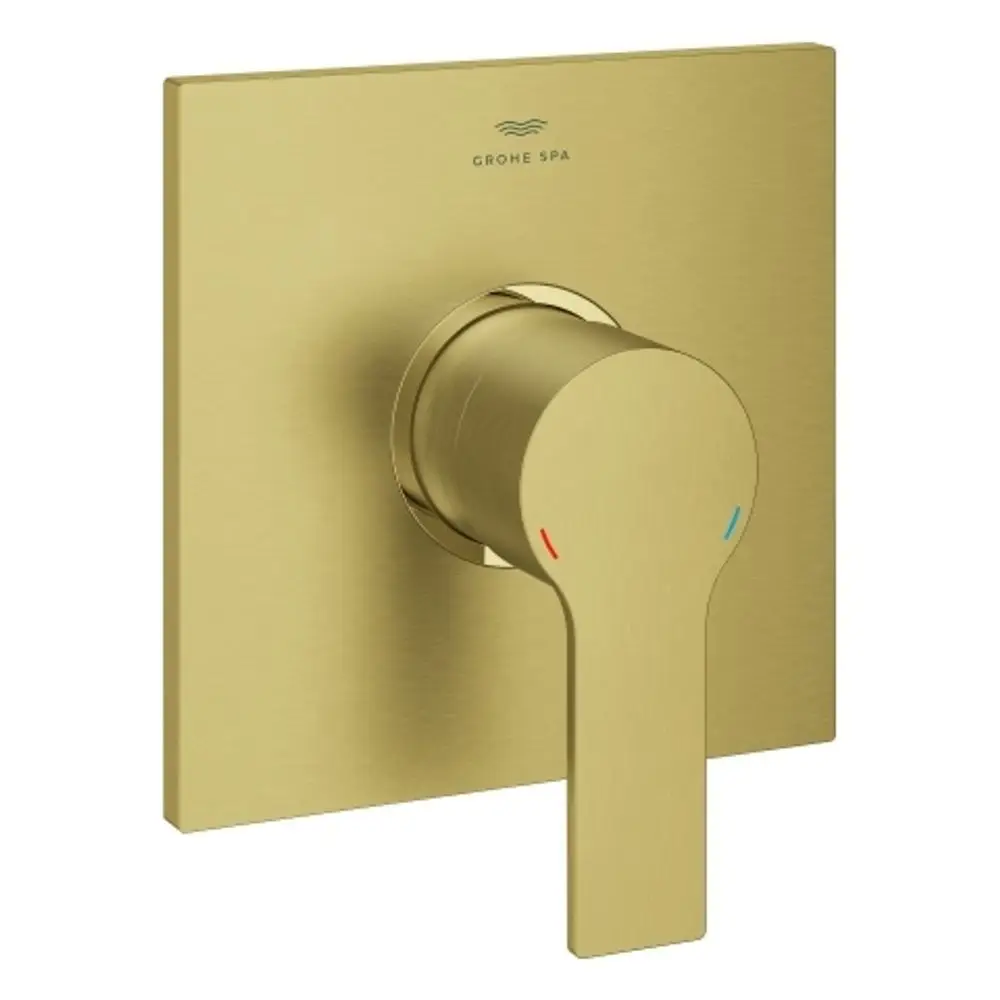 GROHE-Brausebatterie mit quadratischem, goldfarbenem Plattendesign und einem runden Bedienhebel. Die Farbmarkierungen erleichtern die Temperaturregelung.