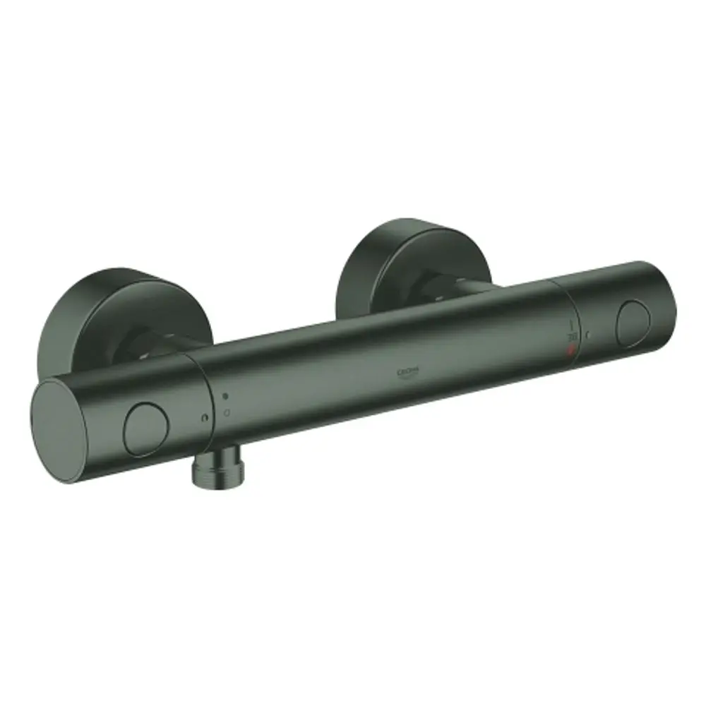 GROHE-Wannenarmatur mit zwei Bedienelementen, montiert an der Wand. Die Oberfläche ist in hartem Graphit gehalten.