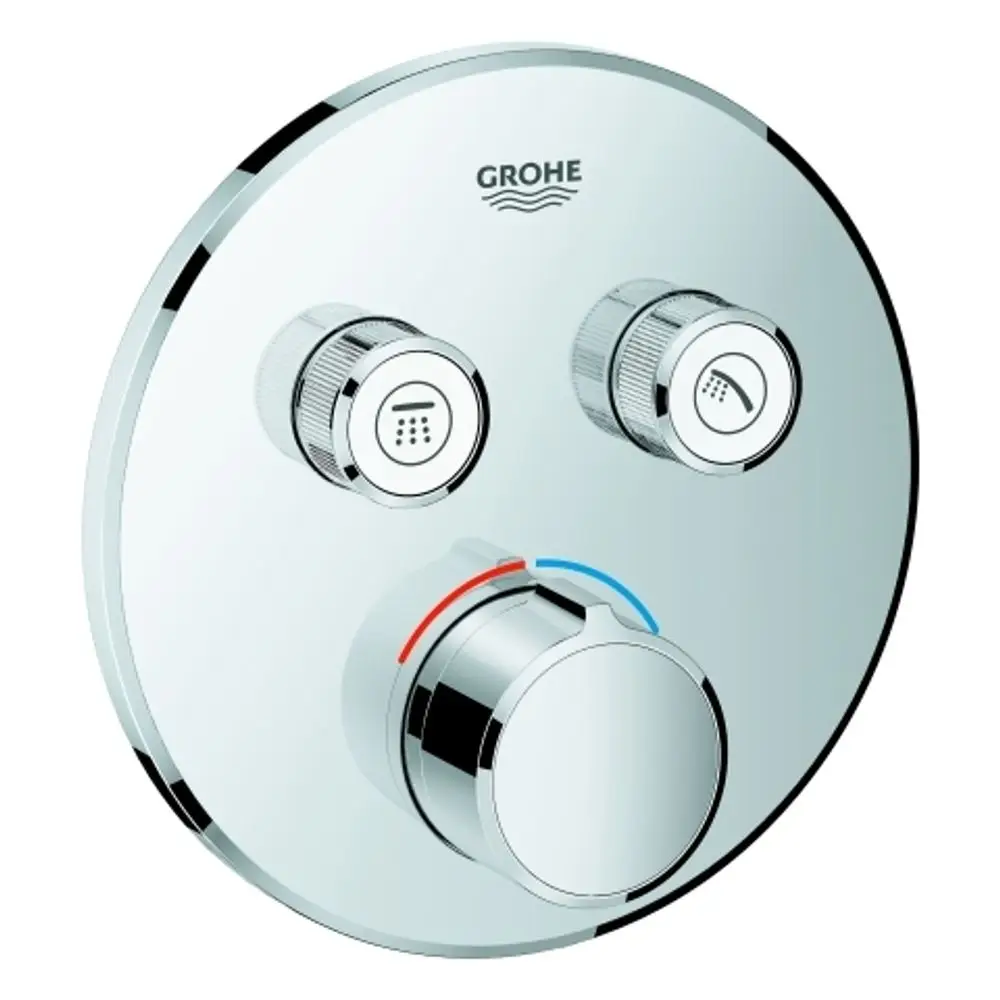 Runder Wandmischer von Grohe mit zwei Absperrventilen. Bedienelemente für Temperatur- und Wassereinlass sind sichtbar, alles in verchromter Oberfläche.