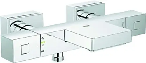 Chromfarbener Wandthermostat mit minimalistischer Bauweise und zwei Bedienknöpfen zur Steuerung von Wasserfluss und Temperatur.
