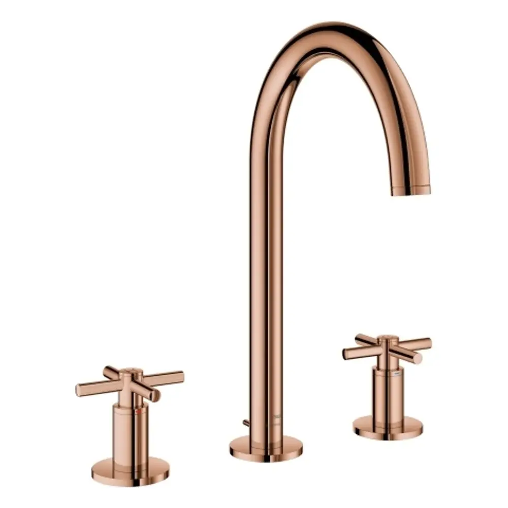 GROHE Armatur mit einem hohen, gebogenen Auslauf und zwei Kreuzgriffen, beide in zarter Kupferfarbe, für eine moderne Badezimmerinstallation.