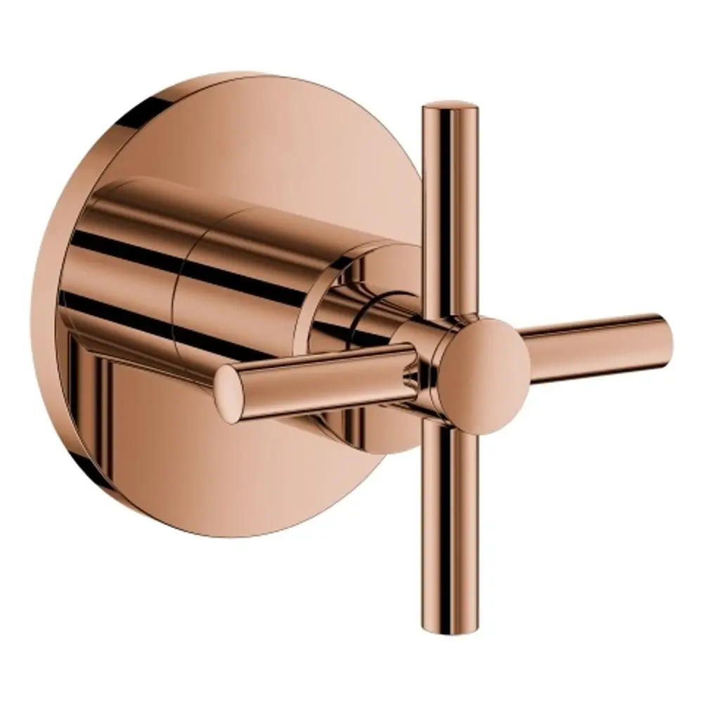 Wandmontierter Grohe Wasserhahn mit Kreuzgriff in warmem Kupferton. Der Griff hat eine klare, funktionale Form und ist auf einer runden Basis montiert.