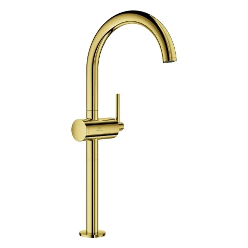 Goldfarbener Grohe Wasserhahn mit hohem Bogen und seitlichem Hebel zur Steuerung des Wasserflusses. Montiert auf einer runden Basis für Stabilität.