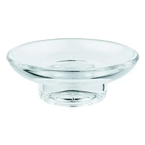 Transparente Seifenschale aus Glas mit runder Form und flachem Rand, platziert auf einem stabilen Sockel. Marke Grohe.