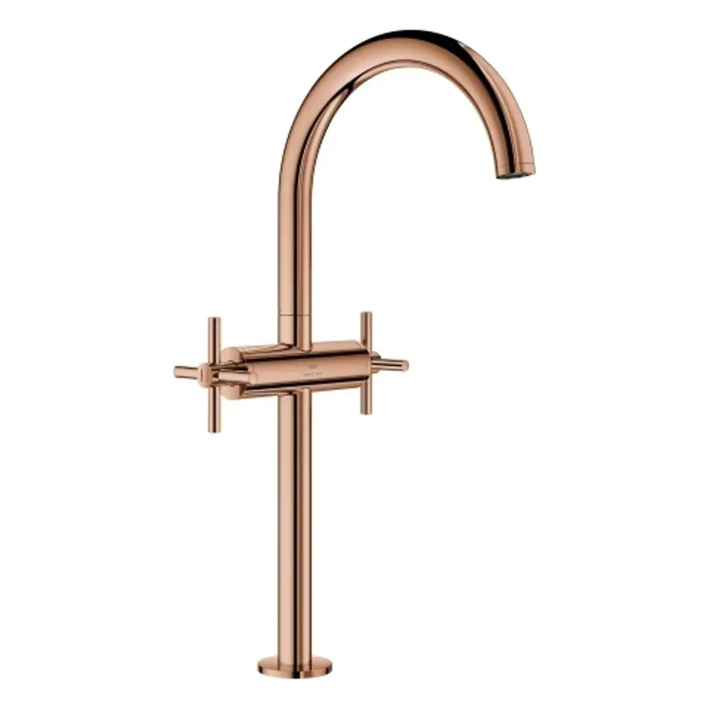 Grohe Einlochbatterie mit einem hohen, geschwungenen Auslauf und Kreuzgriff. Die Oberfläche hat einen warmen Farbton, der an Sonnenuntergang erinnert. Ideal für moderne Badezimmer.