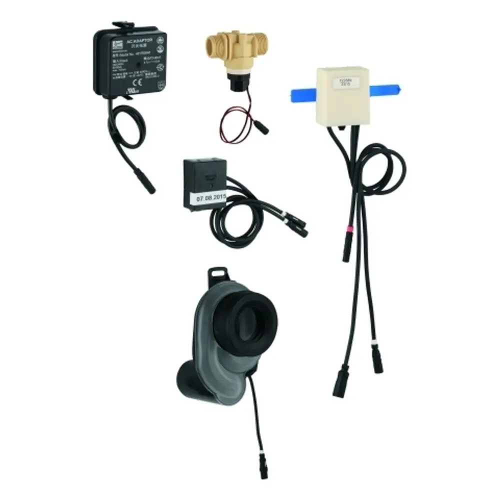 GROHE Temperatursensor in beige, verbunden mit mehreren Kabeln, einer Siegelkappe und einem Stecker. Zubehörteile für die Installation in einem Urinal.