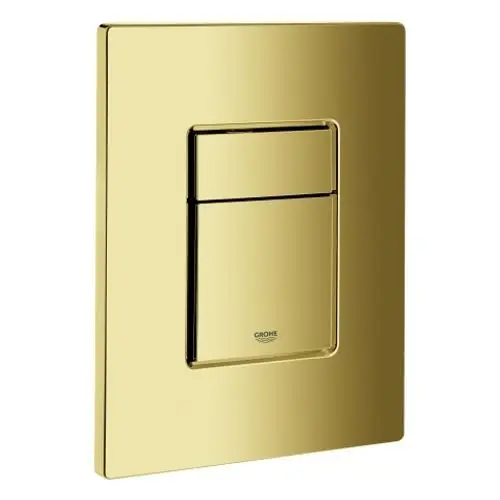 GROHE Betätigungsplatte in Goldfarbe mit zwei Tasten für die WC-Betätigung, rechteckige Form mit einem glänzenden Finish, montiert auf einer flachen Unterlage.