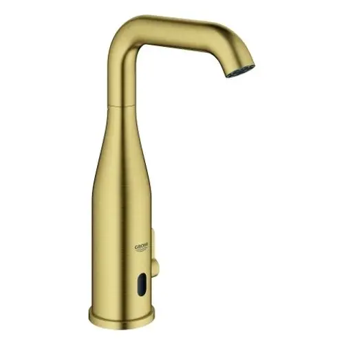 Goldfarbener Wasserhahn von Grohe mit gebürsteter Oberfläche und integrierter Elektronik. Der Hahn hat eine geschwungene Form und einen seitlichen Bedienknopf.