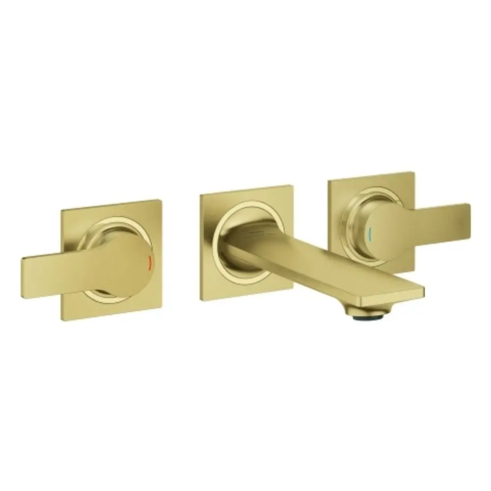 Wandbatterie mit zwei Bedienhebeln in gebürstetem Goldton, hergestellt von Grohe, mit einem klaren, modernen Design und einer mittellangen Auslauföffnung.