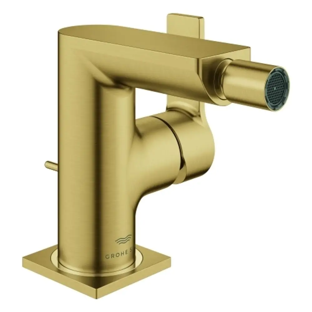 GROHE Bidetarmatur in gebürstetem Gold mit einer rechteckigen Basis und einem seitlichen Hebel zur Wasserregulierung. Der Auslauf ist zylindrisch mit einem feinen Sieb.