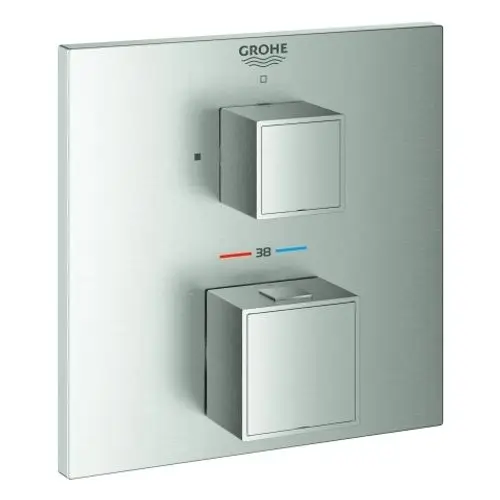 GROHE Steuerungseinheit mit zwei quadratischen Reglerschaltern auf einer Edelstahl-Oberfläche. Ein Schalter für die Temperaturregelung, der andere für den Wasserfluss.