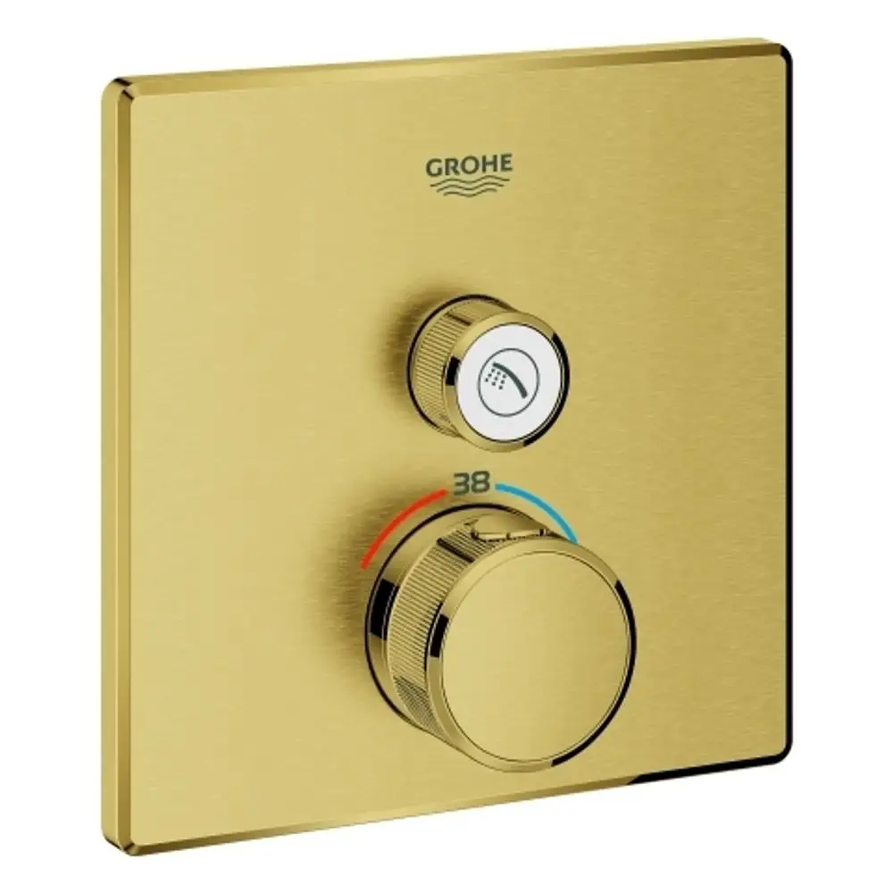 GROHE Thermostat mit zwei Reglern auf einer goldenen Platte. Der linke Regler zeigt ein Symbol für den Wasserfluss, der rechte Regler ist für die Temperatur.