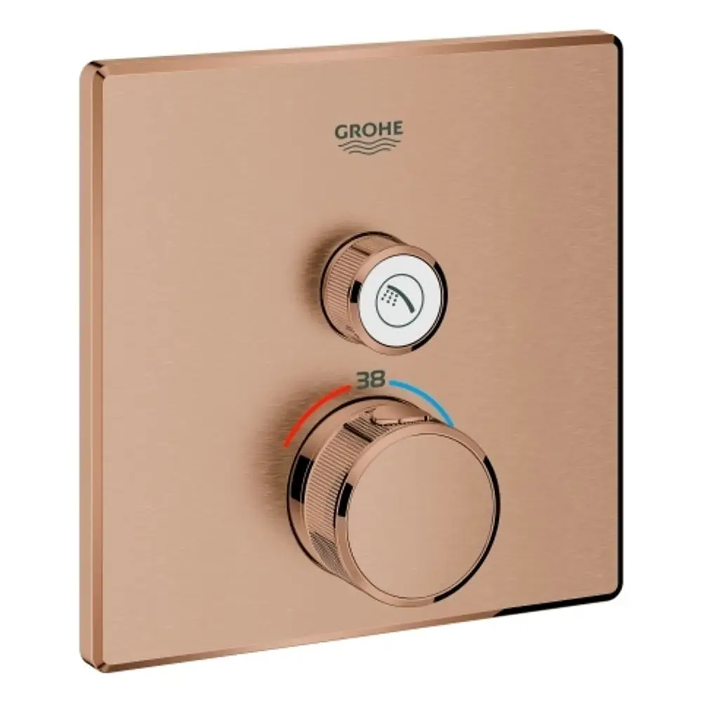 Thermostat von Grohe in quadratischer Form, bestehend aus einem Temperaturregler und einem Wasserabnehmer. Die Oberfläche ist in einem warmen, metallischen Farbton.