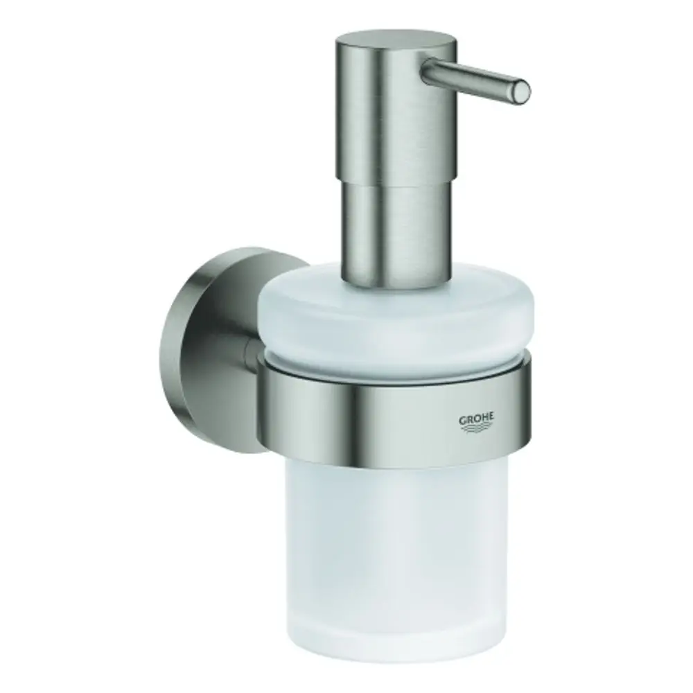 Seifenspender aus Glas mit Halterung aus Edelstahl, montiert an einer Wand. Das Design ist modern und schlicht, typisches Produkt von Grohe.