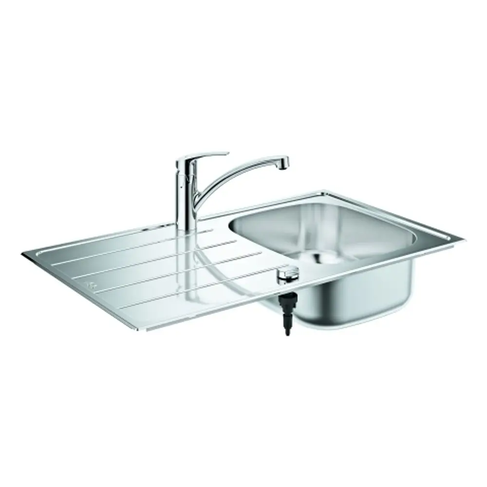 Edelstahlspüle mit integriertem Wasserhahn von Grohe, abgerundeten Kanten und einem Ablagebereich, montiert auf einer glatten Oberfläche.