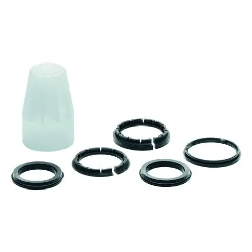 GROHE Dichtungsset bestehend aus einer klaren Kappe und mehreren schwarzen Dichtungsringen in verschiedenen Formen, geeignet für Küchenarmaturen.