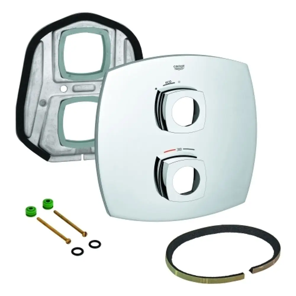 Grohe-Badarmatur mit zwei Reglern auf einer verchromten Plattenoberfläche, umgeben von Montagematerial wie Schrauben und Dichtungen.