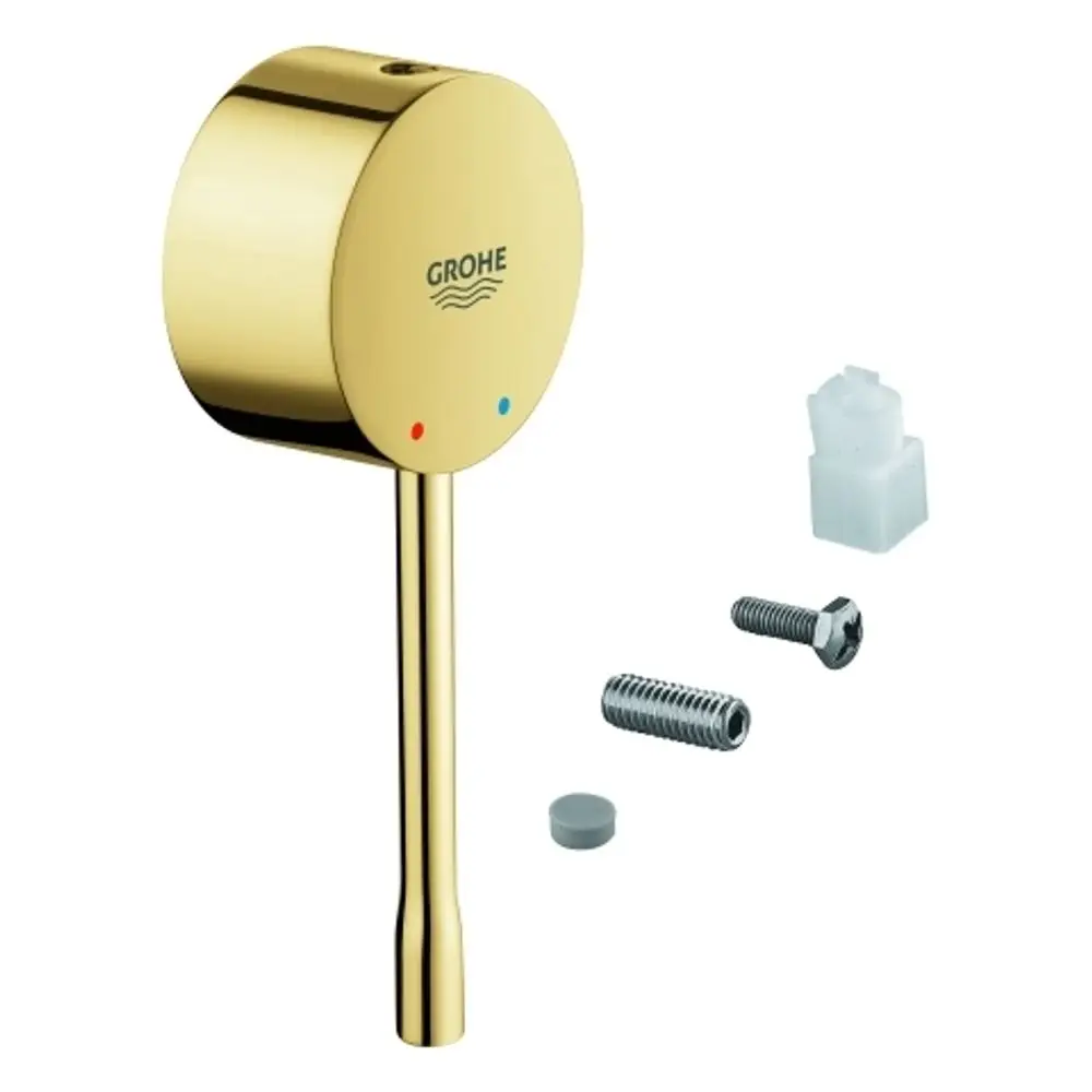 Goldfarbener Hebel mit zwei farbigen Punkten von Grohe, dazu zwei Schrauben, ein Gummistopper und ein kleiner Kunsstoffclip.