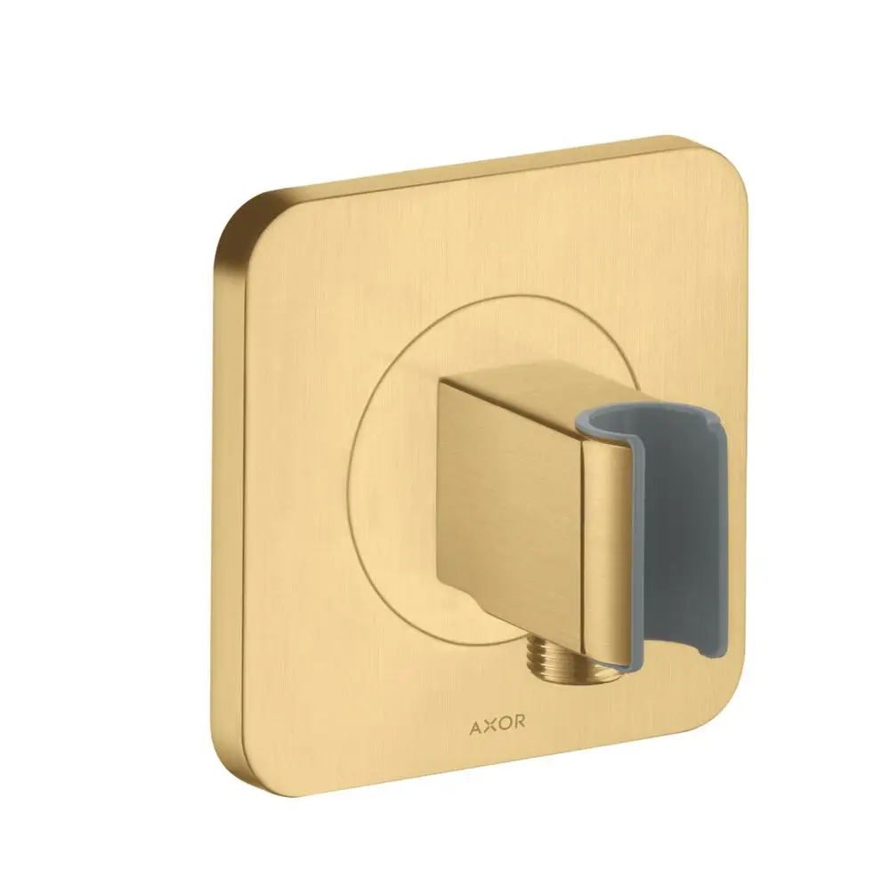 Wandmontierte Halterung in gebürstetem Gold von AXOR mit quadratischer Basis und einer darauf befestigten, grauen Halterung.