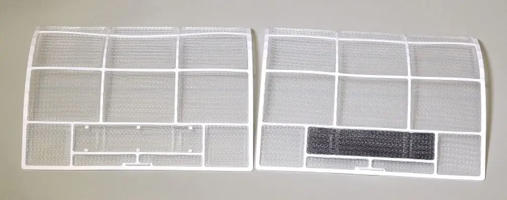 Luftfilter von Remko, bestehend aus zwei transparenten Kunststoffplatten mit Gitterstruktur, zur Luftreinigung in Geräten.