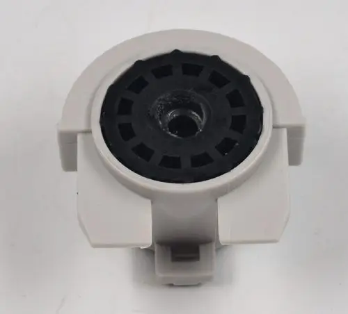 Gummilager für Ventilatorrad, graues Gehäuse mit schwarzem Einsatz. Teil möglicherweise von Remko für Klimaanlagen oder Heizsysteme.