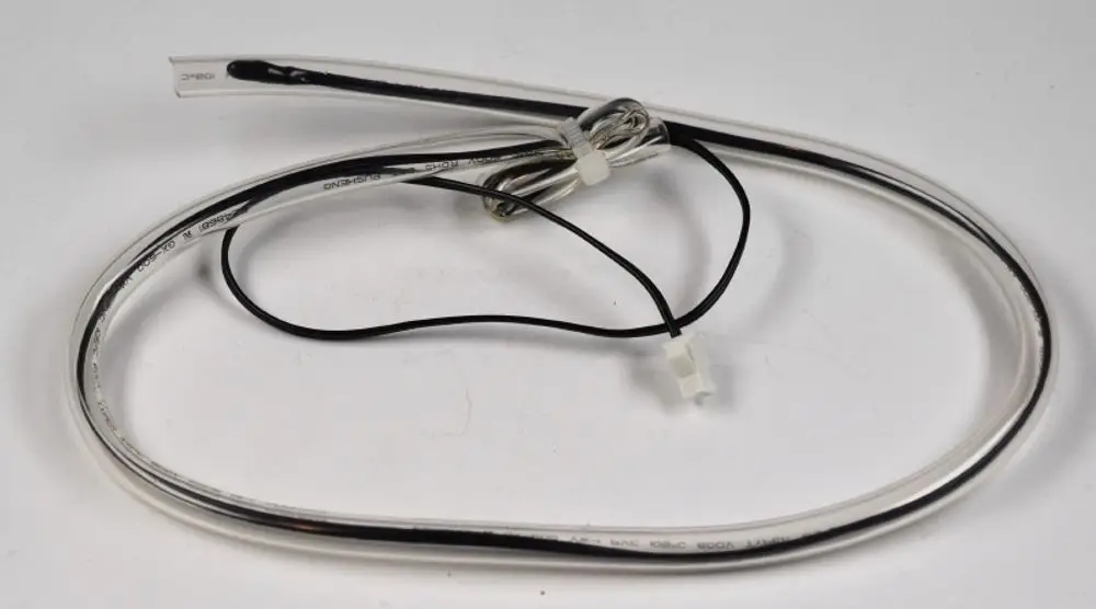 Temperatursensor mit transparentem Gehäuse und mehreren Kabeln, gekennzeichnet mit der Marke Remko, zur Messung von Lufttemperatur im Eingangsbereich.