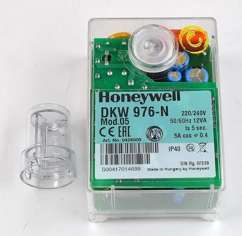 Honeywell Steuerrelais in transparentem Gehäuse mit verschiedenen elektrischen Komponenten, gekennzeichnet mit Modellinformation und technischen Spezifikationen.