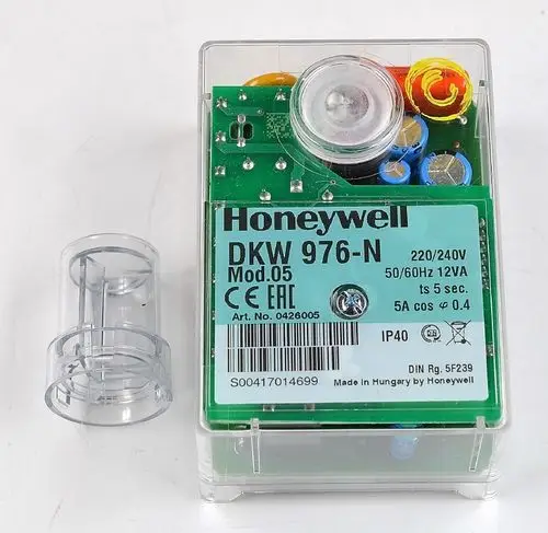 Honeywell Steuerrelais in transparentem Gehäuse mit verschiedenen elektrischen Komponenten, gekennzeichnet mit Modellinformation und technischen Spezifikationen.