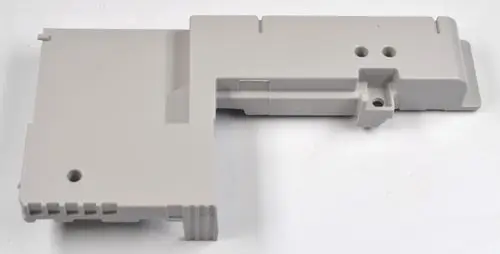 Graue Kunststoffabdeckung, passend für elektronische Bauteile. Teile von Remko zur Sicherung oder Abdeckung der Platine, ohne spezifische Maße oder Details erkennbar.