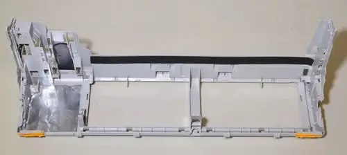 Gehäuse-Element von Remko, bestehend aus einem transparenten und grauen Kunststoffeinsatz, ohne Sicht auf spezifische Maße oder zusätzliche Details.