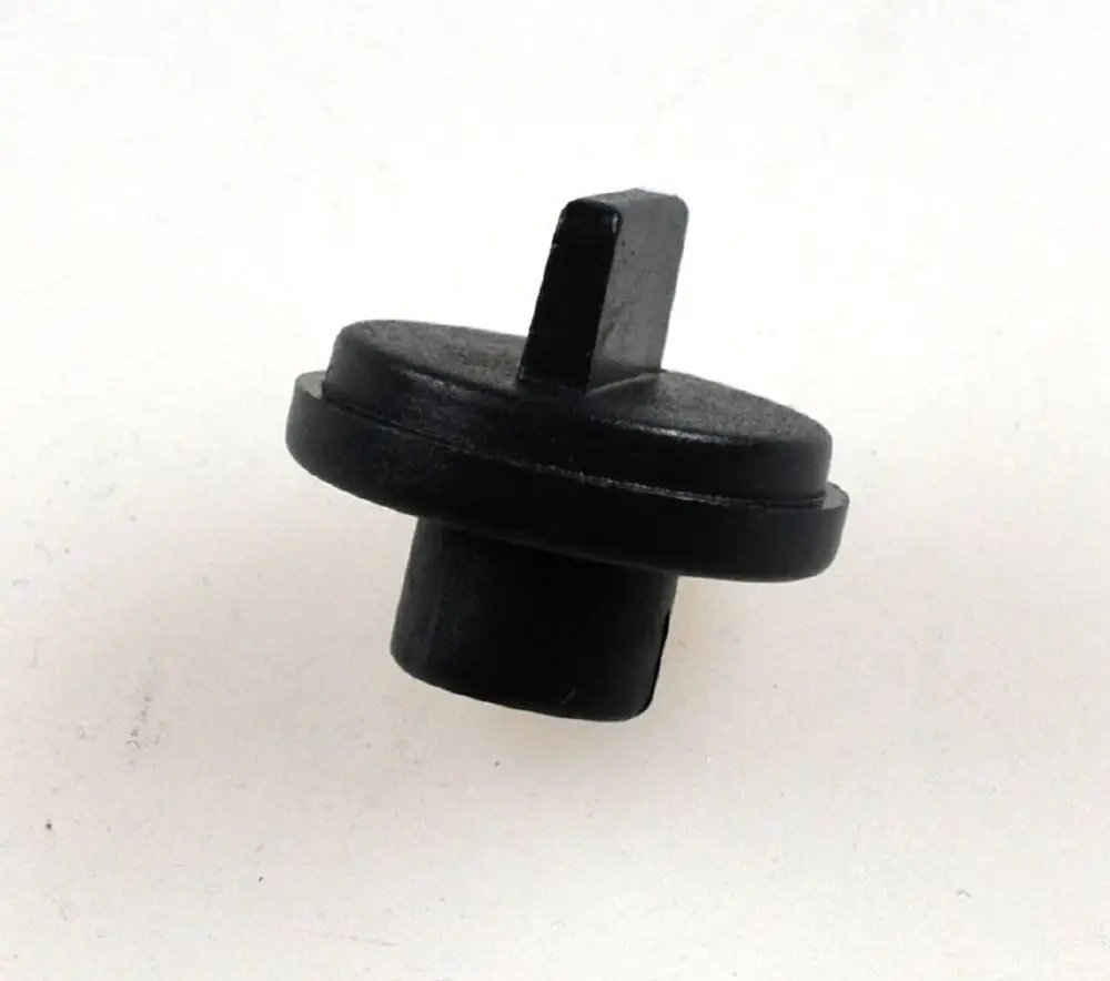 Schwarzer Thermostatknopf von Remko, runde Form mit seitlichem Stift, geeignet für Heizgeräte oder Thermostatventile.
