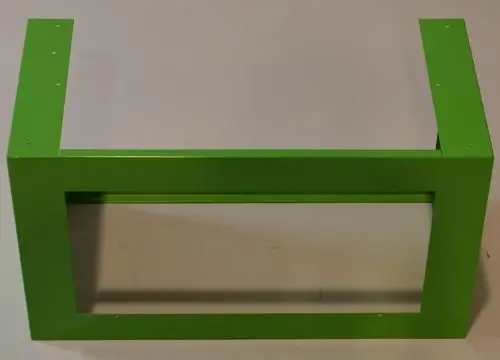 Grüne Metallrahmenstruktur, möglicherweise für eine Warmlufthaube von Remko, ohne erkennbare Maße oder spezifische Details.