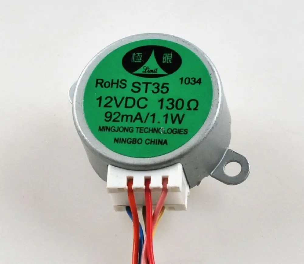 Motor mit grünem Aufkleber, 12V DC, 130 Ohm, 92mA, hergestellt von Mingjong Technologies in Ningbo, China. Teil einer Remko-Anlage.