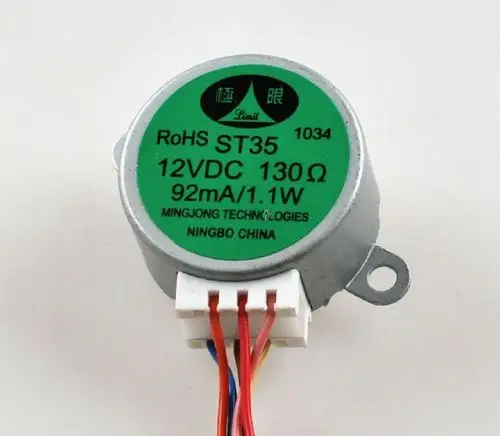 Motor mit grünem Aufkleber, 12V DC, 130 Ohm, 92mA, hergestellt von Mingjong Technologies in Ningbo, China. Teil einer Remko-Anlage.