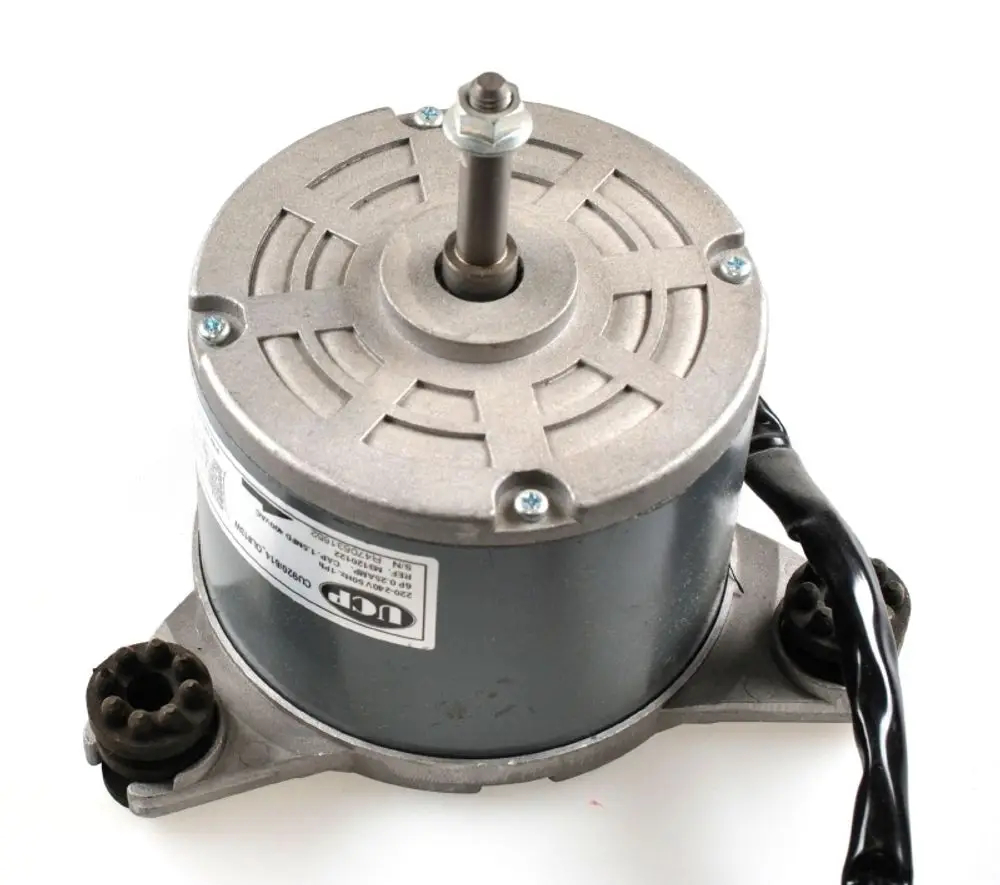 Ventilatormotor von Remko, runder Gehäuse mit zentraler Welle, Anschlüsse für elektrische Verbindungen, Basis zur Montage mit mehreren Löchern.