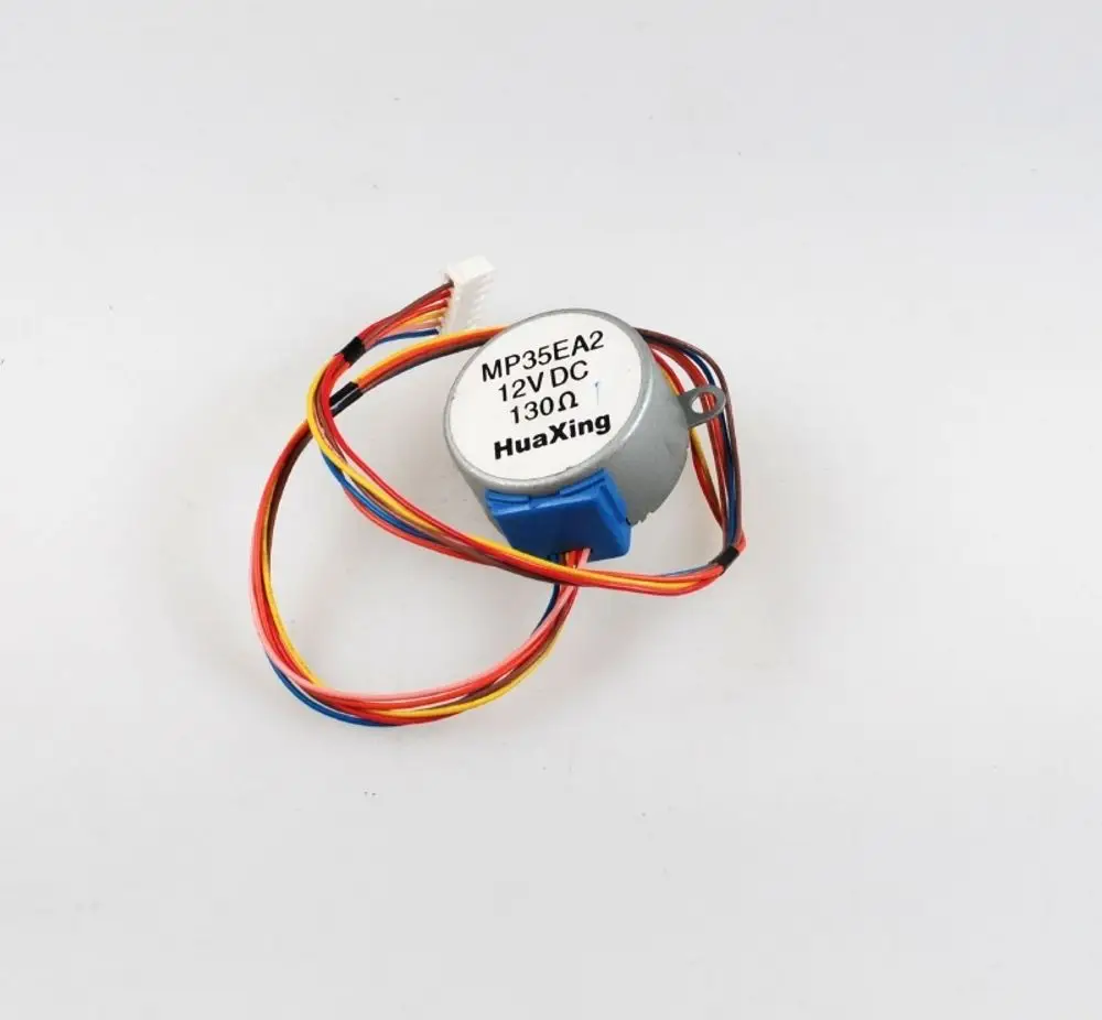DC-Motor mit mehreren Anschlussdrähten, beschriftet mit "HuaXing" und "12V DC", geeignet für Anwendungen in verschiedenen Geräten, einschließlich Remko-Produkten.