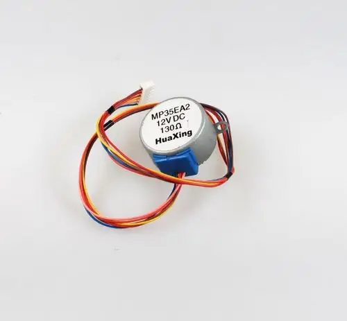 DC-Motor mit mehreren Anschlussdrähten, beschriftet mit "HuaXing" und "12V DC", geeignet für Anwendungen in verschiedenen Geräten, einschließlich Remko-Produkten.