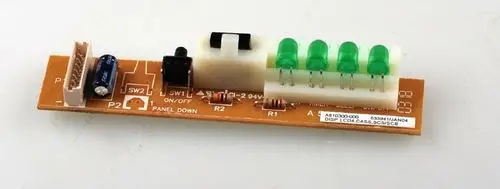 Platine mit mehreren grünen LEDs, Schaltern und Anschlüssen. Teil eines Geräts der Marke Remko, wahrscheinlich zur Steuerung oder Anzeige von Funktionen.