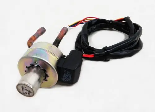 Spule mit Metallgehäuse und mehreren Anschlüssen, angeschlossen durch Kabel mit einer elektrischen Steckverbindung, hergestellt von Remko.