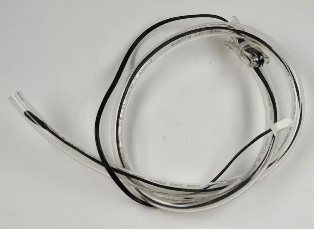 Temperatursensor aus transparentem Kunststoff mit mehreren Drähten, erkennbar durch die Markierung „Remko“. Die Sensorkopf- und Kabelkonstruktion ist deutlich sichtbar.