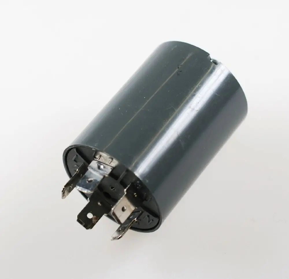 Netzfilter von Remko, zylindrische Bauform mit mehreren Anschlüssen an der Unterseite, in grauer Farbe.