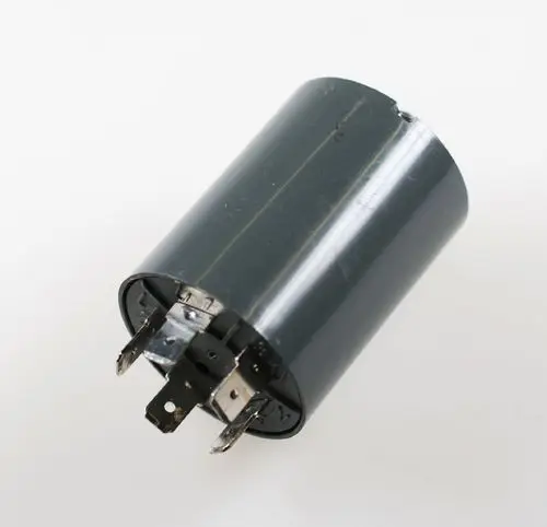 Netzfilter von Remko, zylindrische Bauform mit mehreren Anschlüssen an der Unterseite, in grauer Farbe.