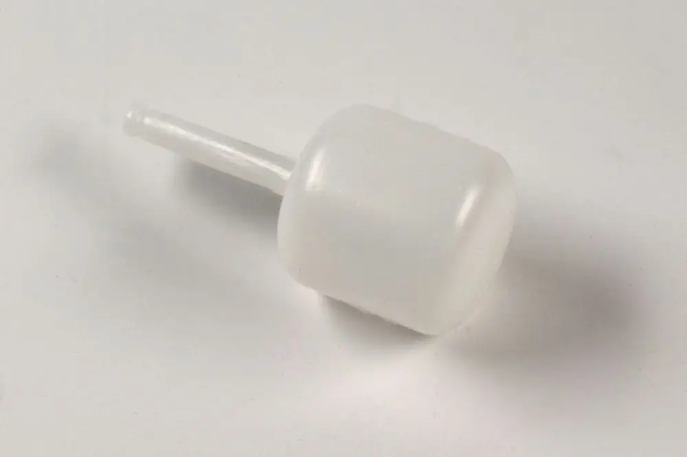 Schwimmer in transparenter Ausführung mit einem kurzen Rohranschluss. Produkt von Remko für Anwendungen in geschlossenen Behältern.