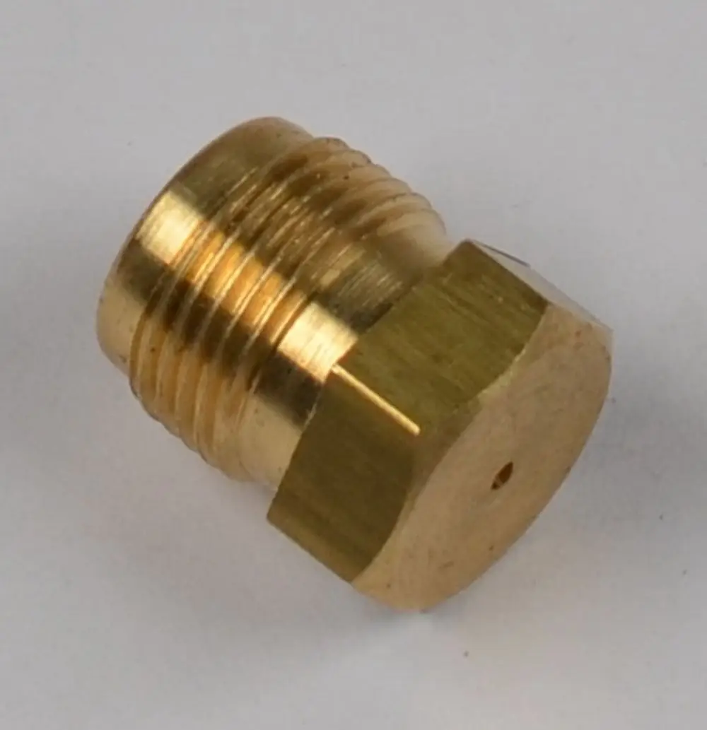 Messingdüse mit gewindeloser Spitze und hexagonalem Sockel, hergestellt von Remko, geeignet für Gasanwendungen und Anschluss an Gasleitungen.