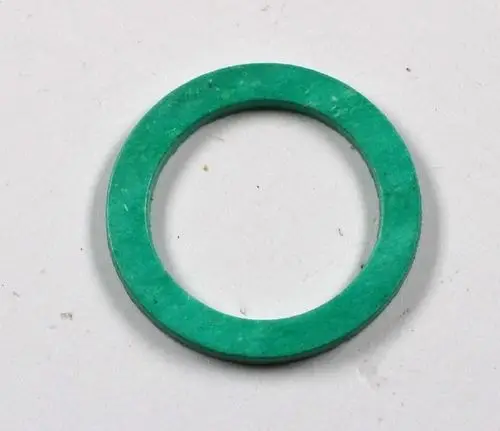Grüne Dichtung, ringförmig, möglicherweise zur Abdichtung einer Gasarmatur oder eines Brenners, hergestellt von Remko.